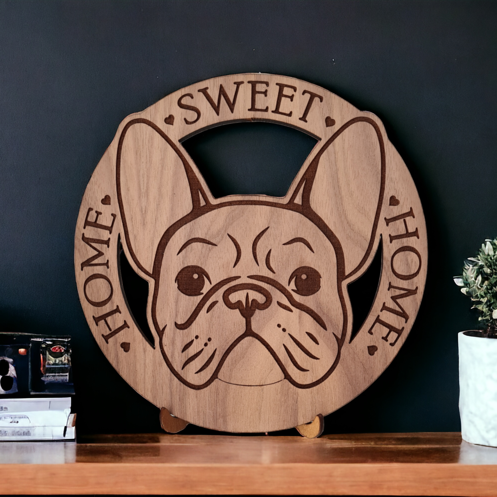 "A custom-made, circular wooden sign, created for a customer who loves French bulldogs."